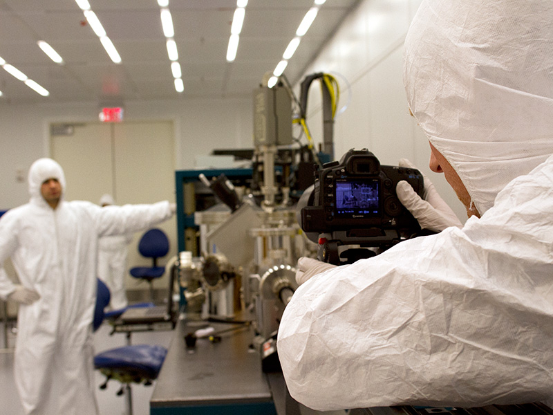 A film crew shoots video of the UH Nanofabrication Facility which features 3,300 square feet of cleanroom space.