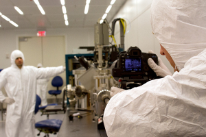A film crew shoots video of the UH Nanofabrication Facility which features 3,300 square feet of cleanroom space.