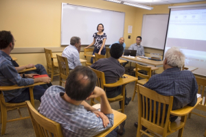 NASA-sponsored student team demonstrates their cube-satellite antenna design for a panel of ECE professors.